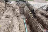 tying-water-and-sewer-into-the-main